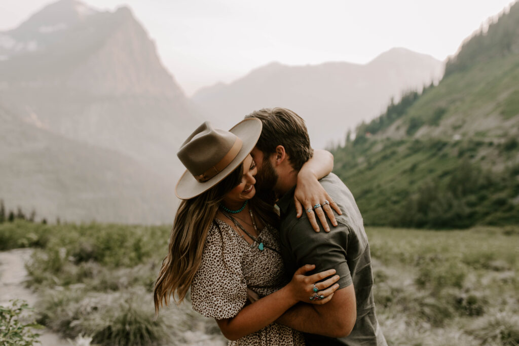Glacier National Park Big Bend Couple Kissing for Engagement Photos