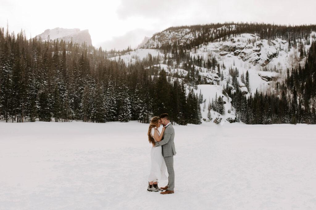 couple kisses in the middle of destination engagement session