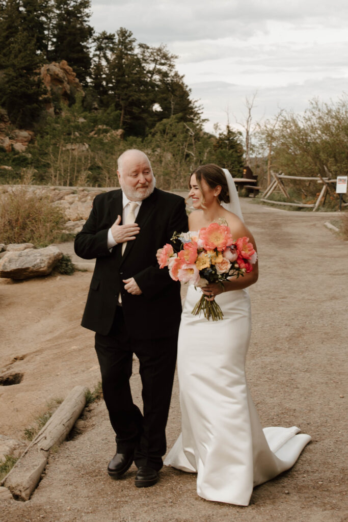 father walks bride down aisle