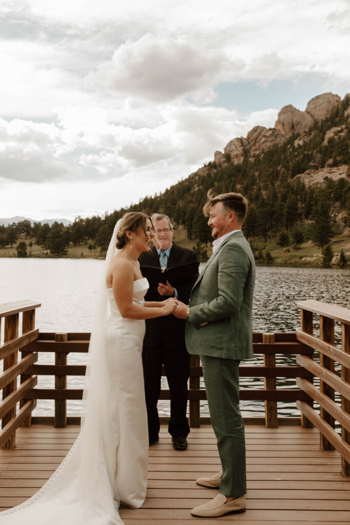 bride and groom laugh together