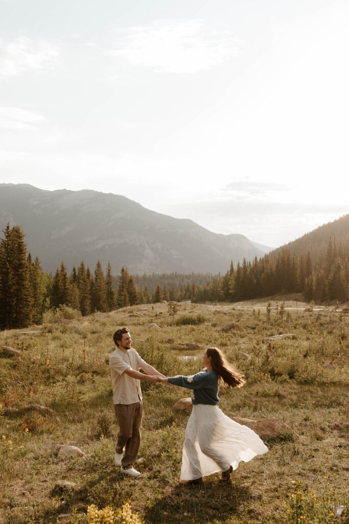 couple spins in the mountain meadow