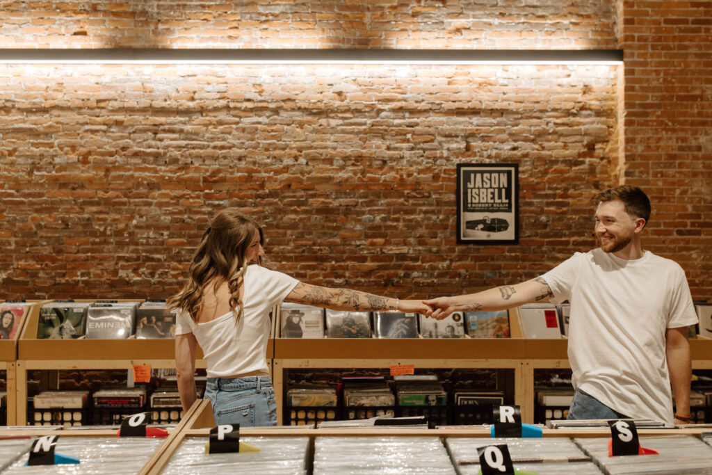 couple dances in record store