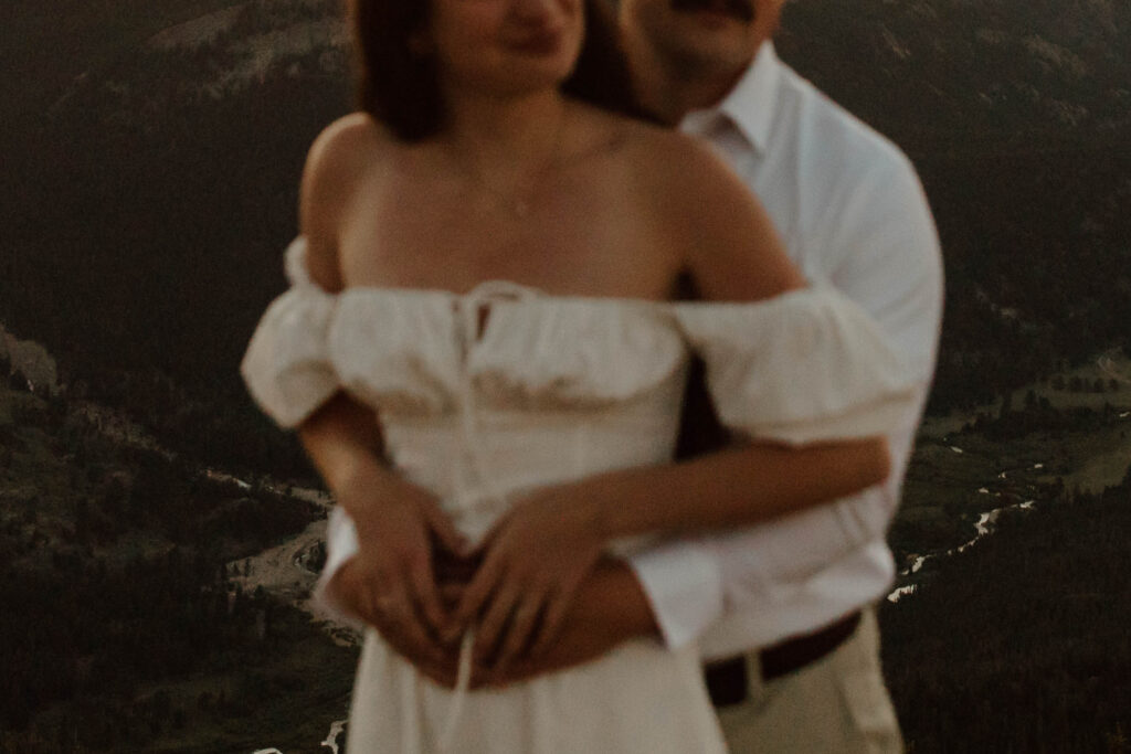 vibey engagement photo in the mountains