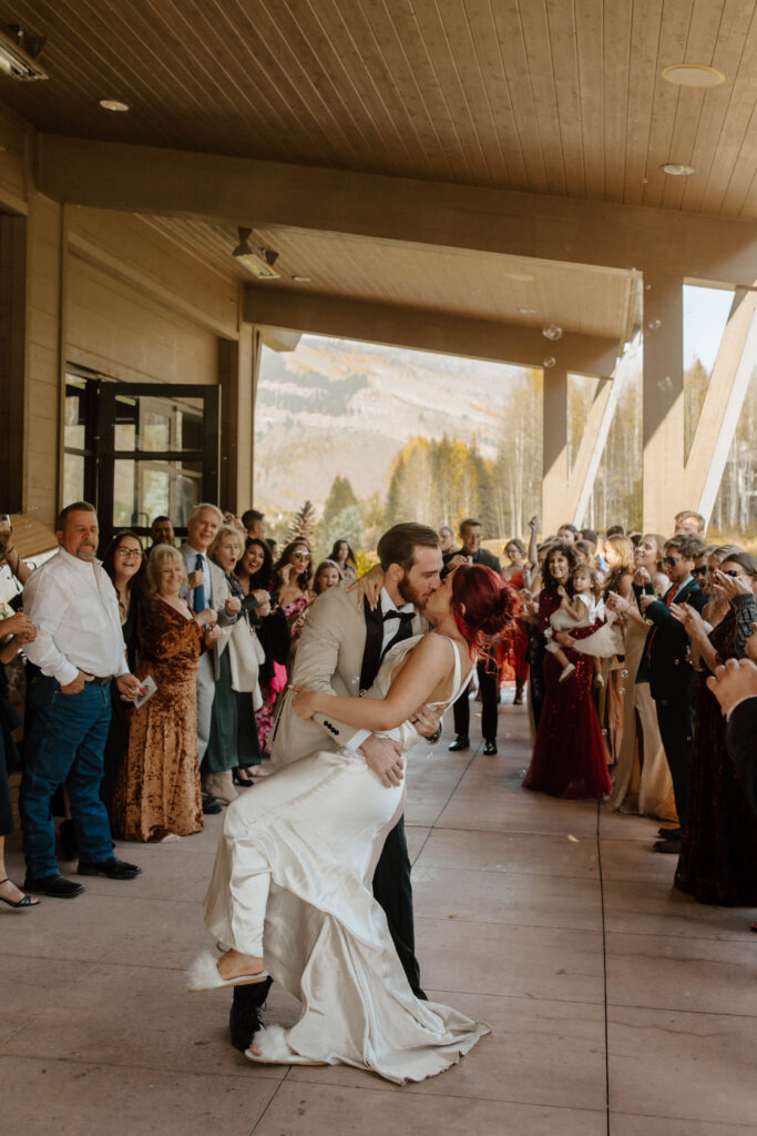 wedding reception ext with a dip and kiss