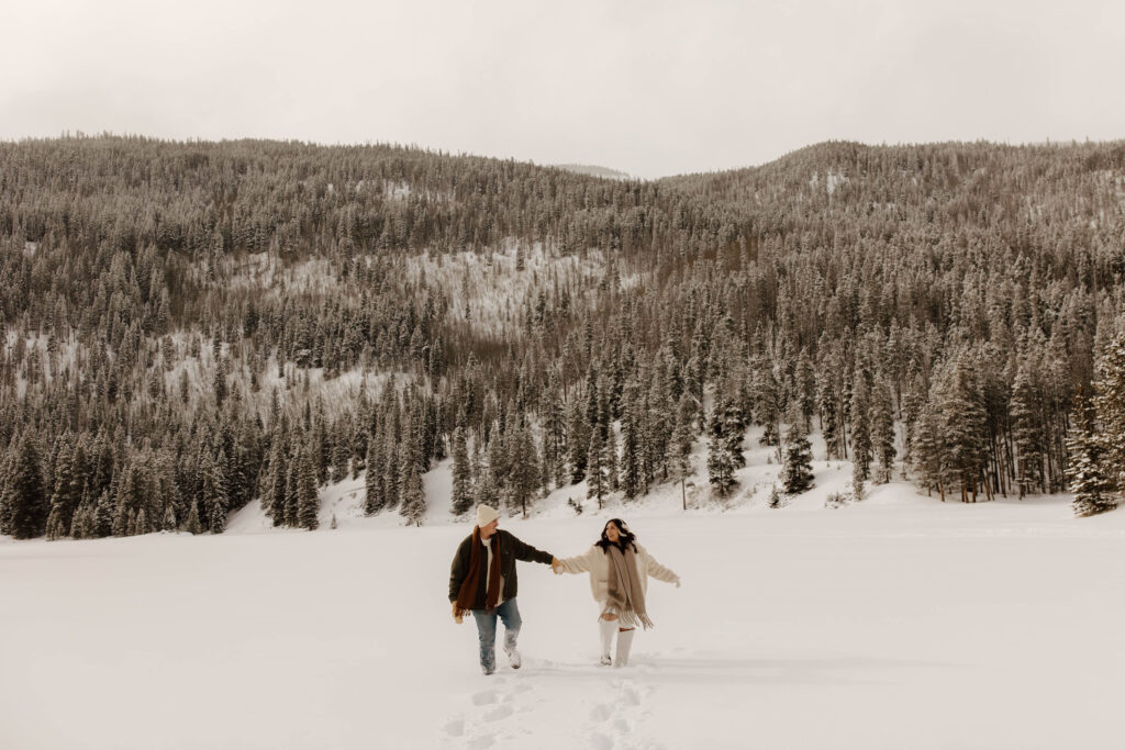 snowy lake engagement photos in colorado