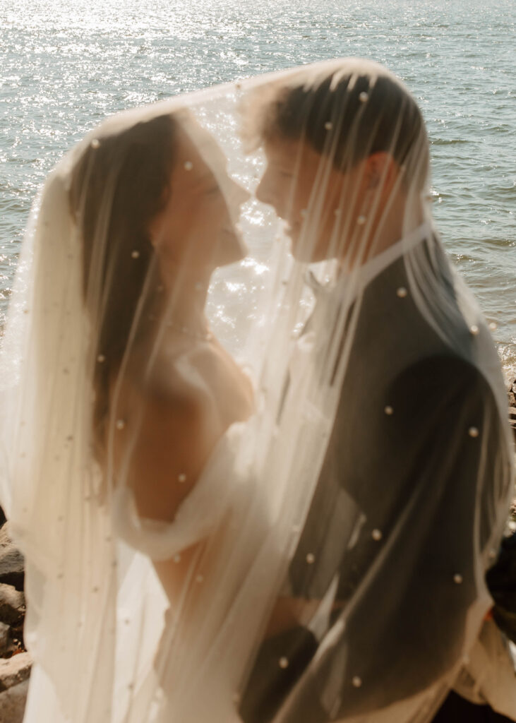 under the veil photos on a lake, colorado wedding photography