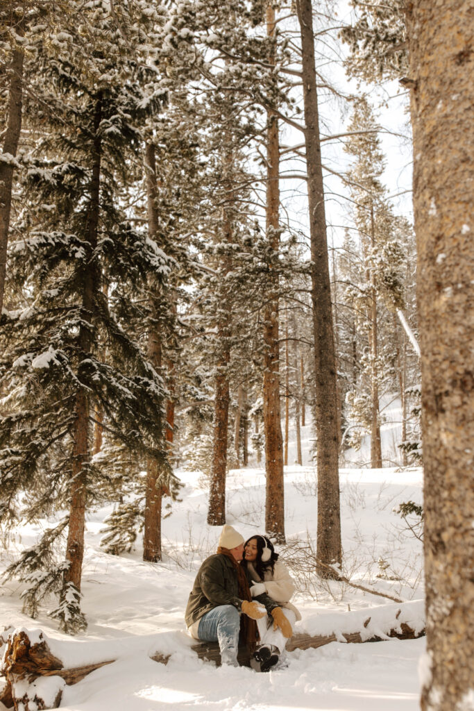 engagement photos in the trees in the colorado mountains