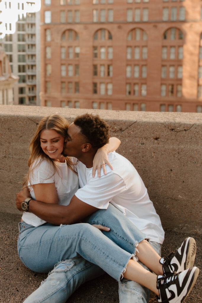 engagement photos on a rooftop downtown Denver