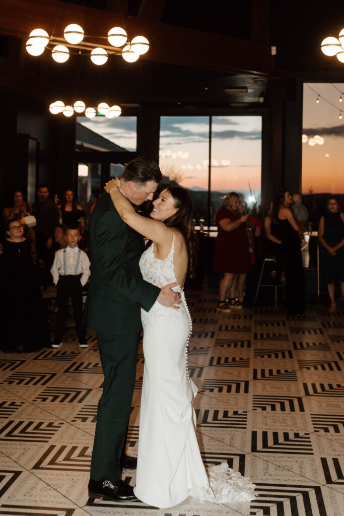 bride and groom first dance at the oaks in castle rock