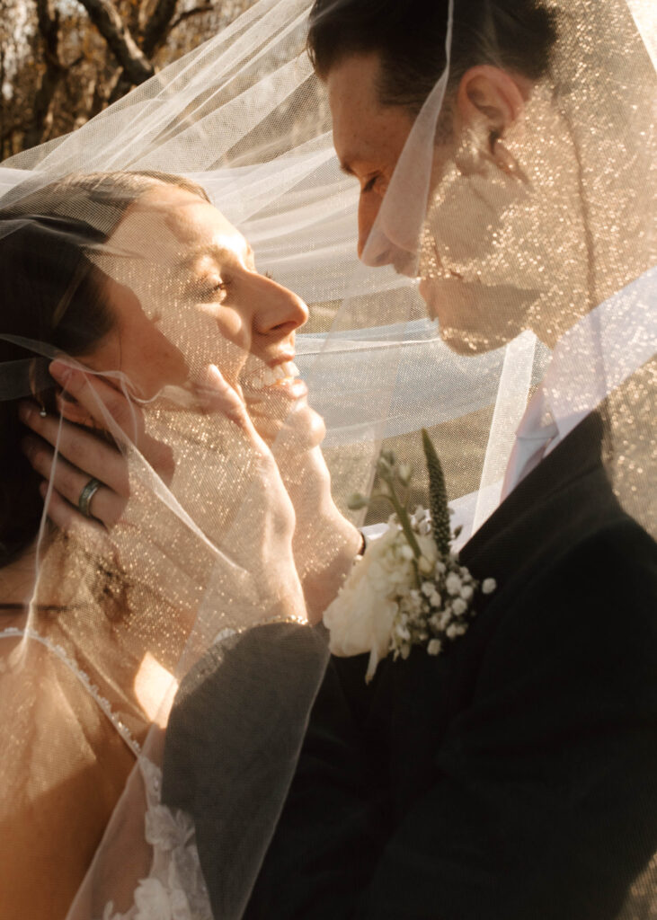 colorado bride and groom under the veil 