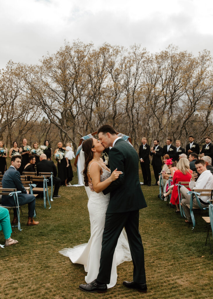 kiss at the end of the aisle