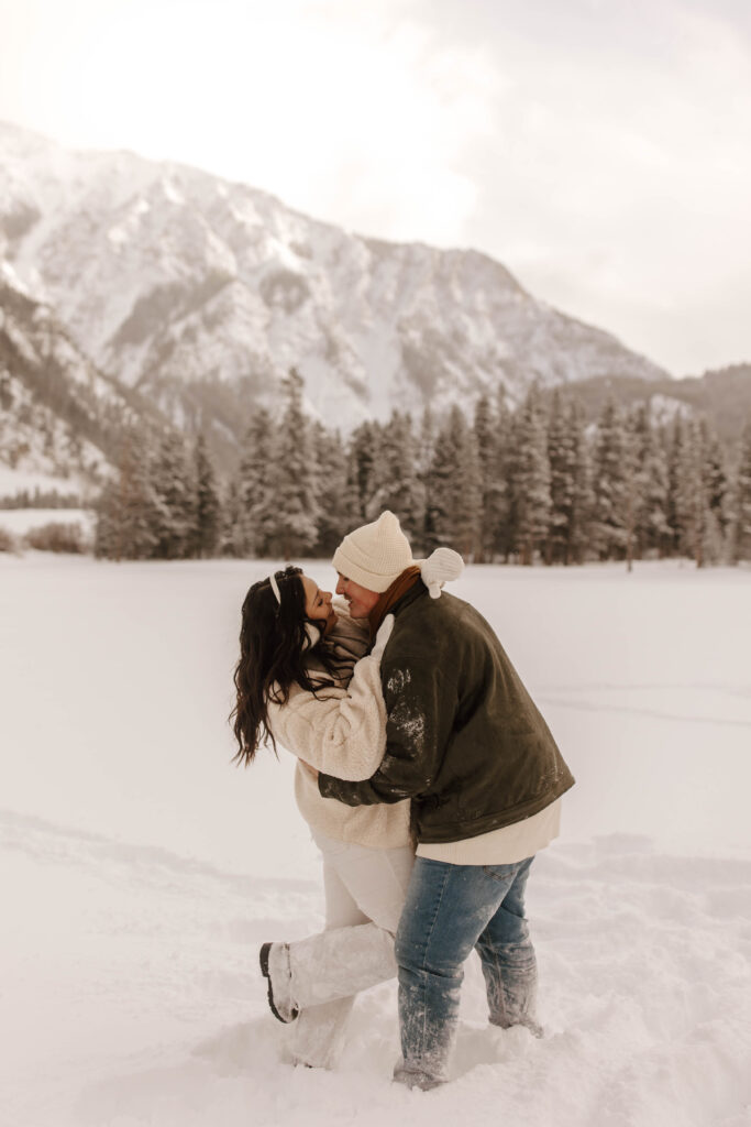 romantic engagement photos in the snow