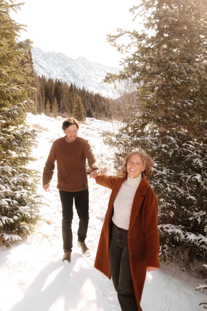 walking through the trees in the mountains