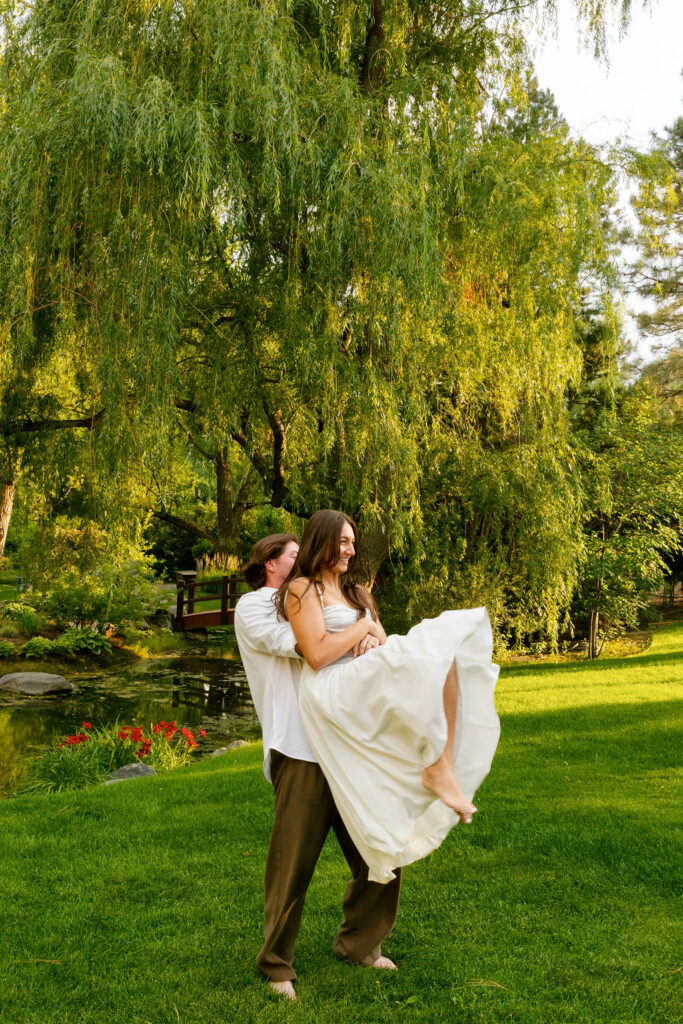 dancing together during engagement photos