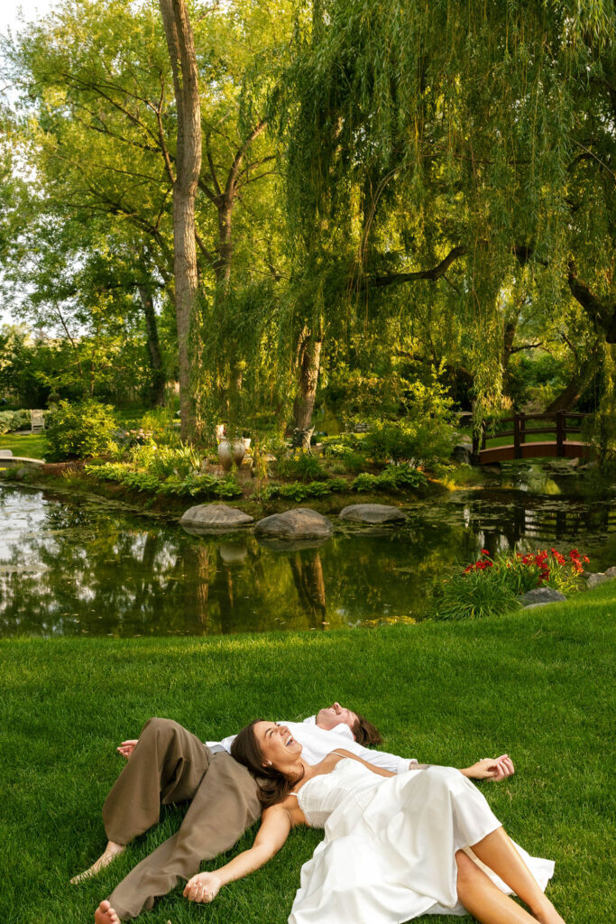 engagement photos on a pond in a garden